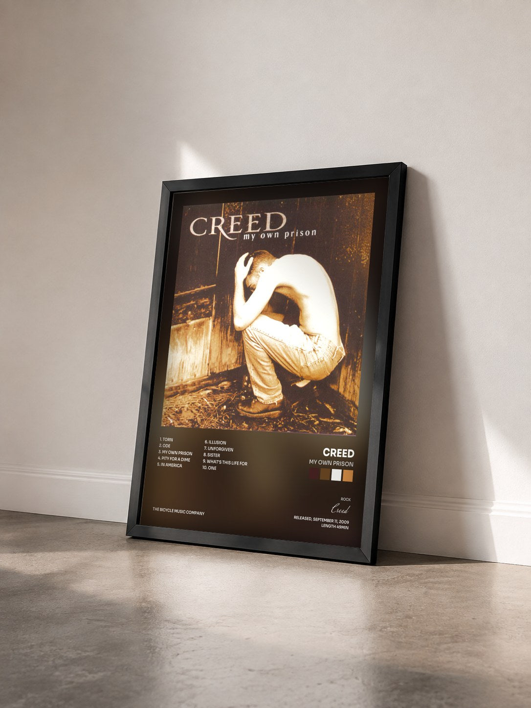 #noir Tableau de l'album My Own Prison de Creed vu de trois quarts, cadre noir