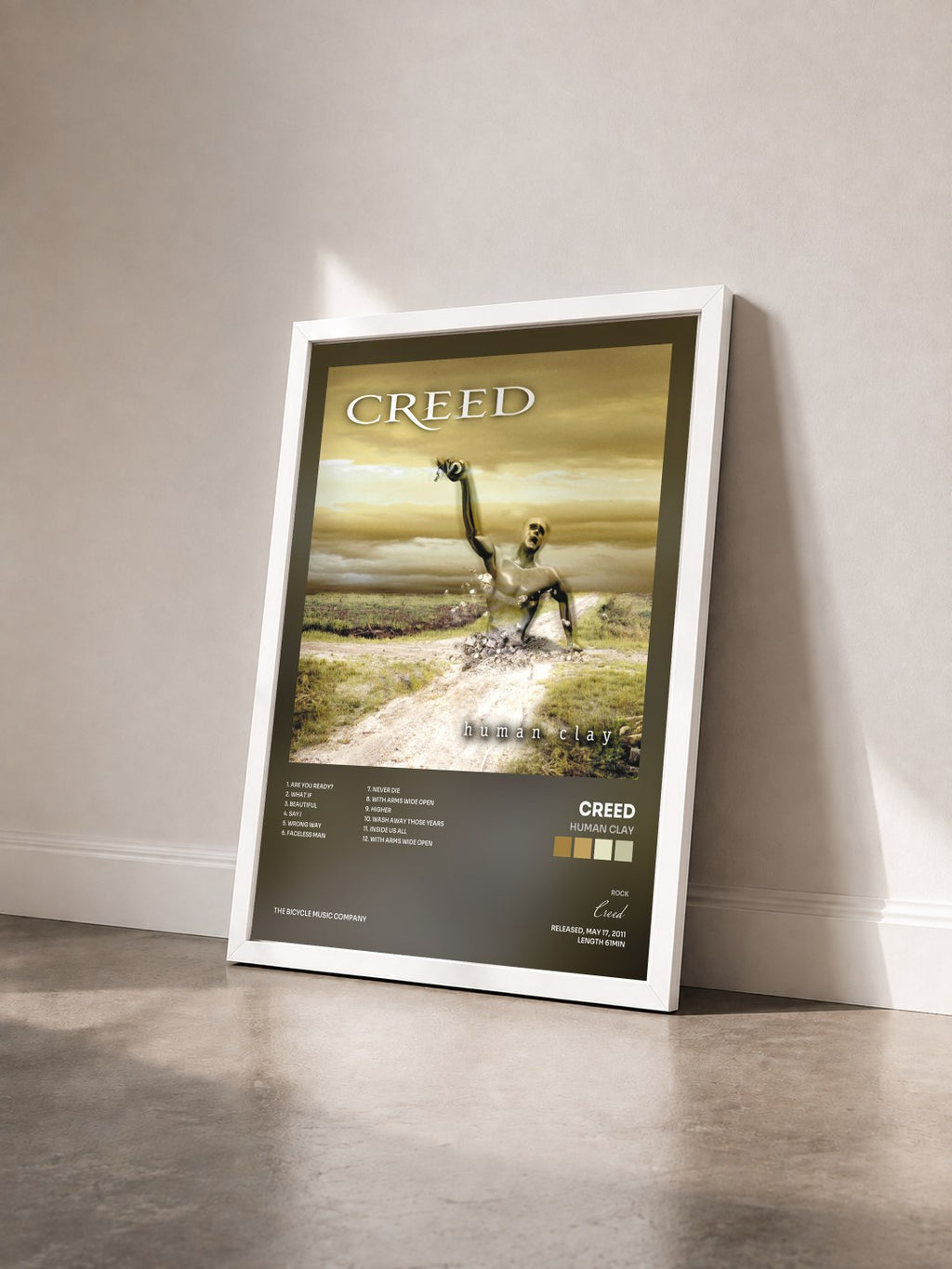 #blanc Tableau de l'album Human Clay de Creed vu de trois quarts, cadre blanc