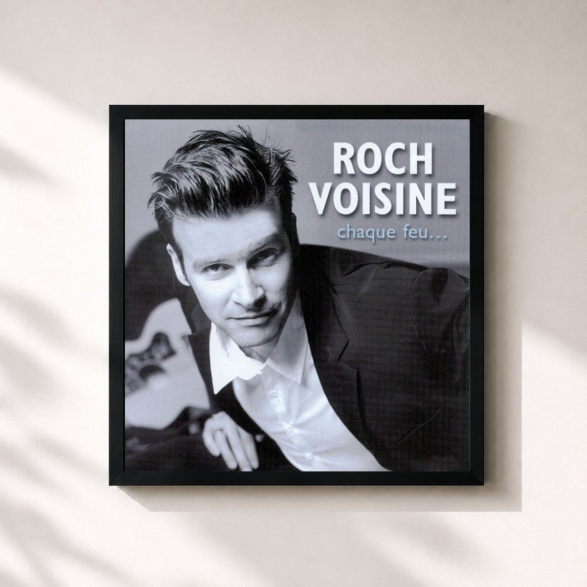 #noir Tableau carré de l'album Chaque Feu... de Roch Voisine, cadre noir 32x32 cm