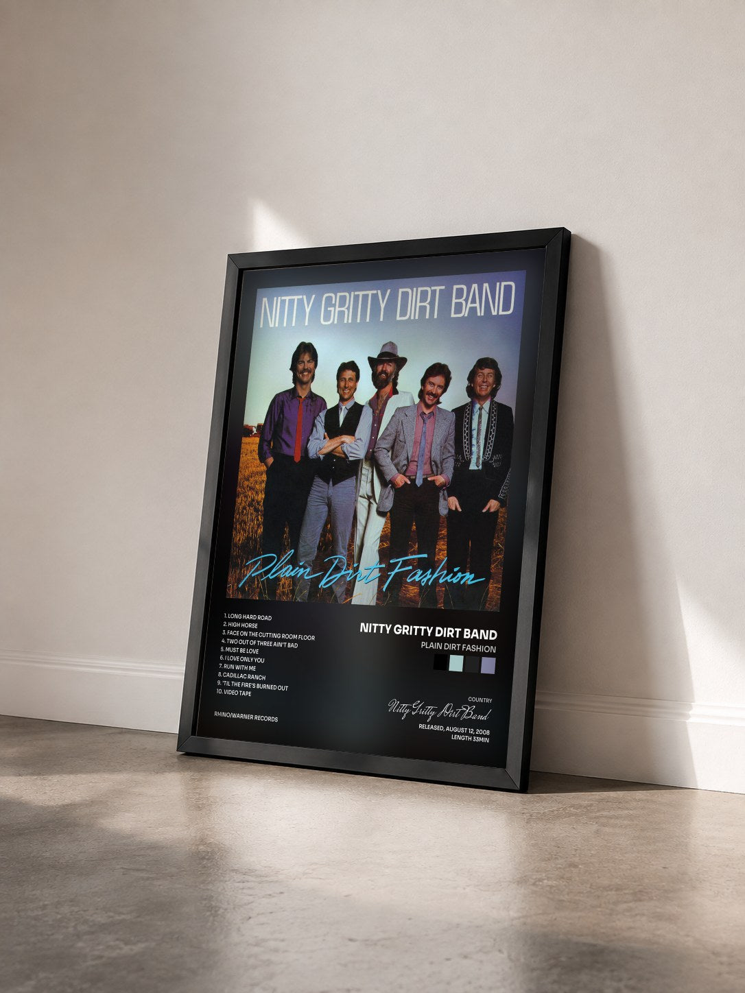 #noir Tableau de l'album Plain Dirt Fashion de Nitty Gritty Dirt Band vu de trois quarts, cadre noir