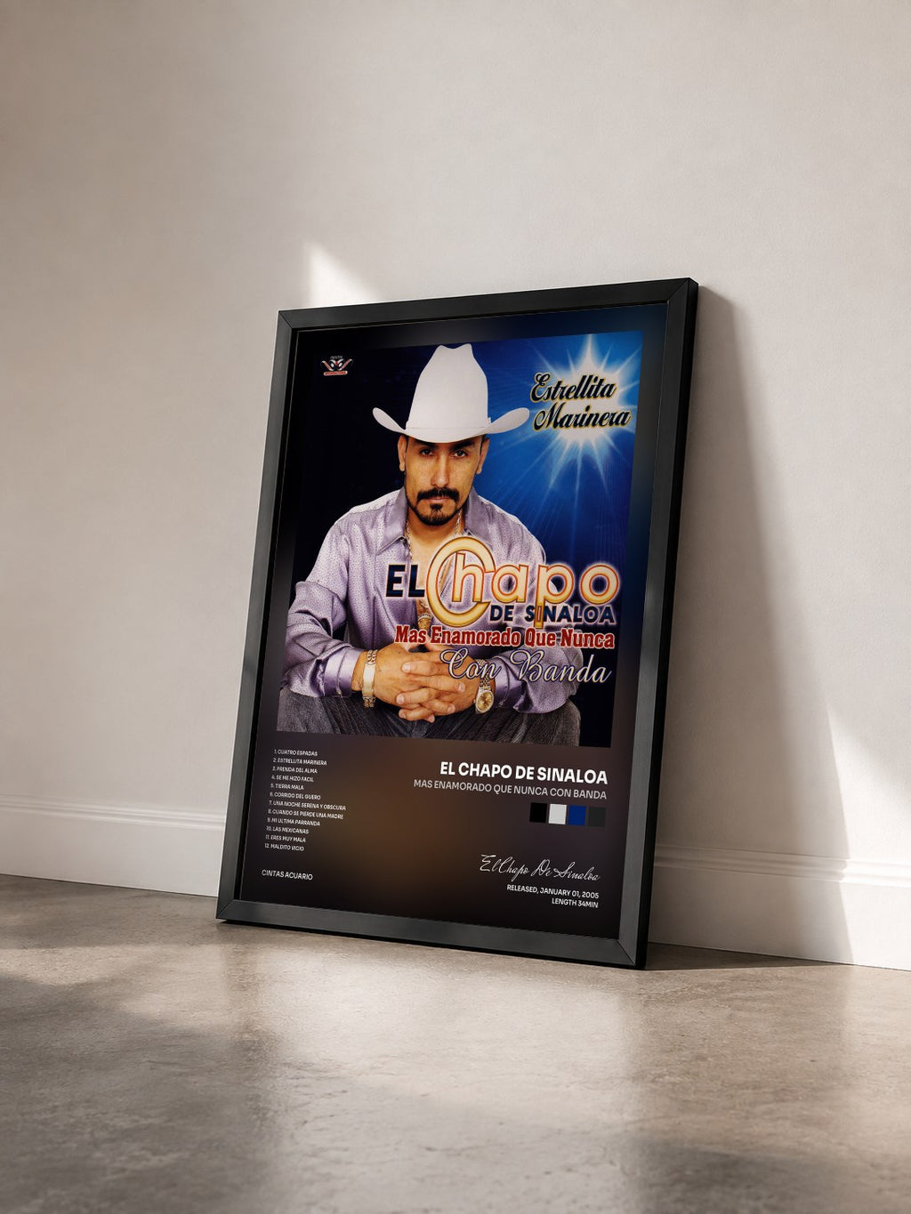 #noir Tableau de l'album Mas Enamorado Que Nunca Con Banda de El Chapo De Sinaloa vu de trois quarts, cadre noir