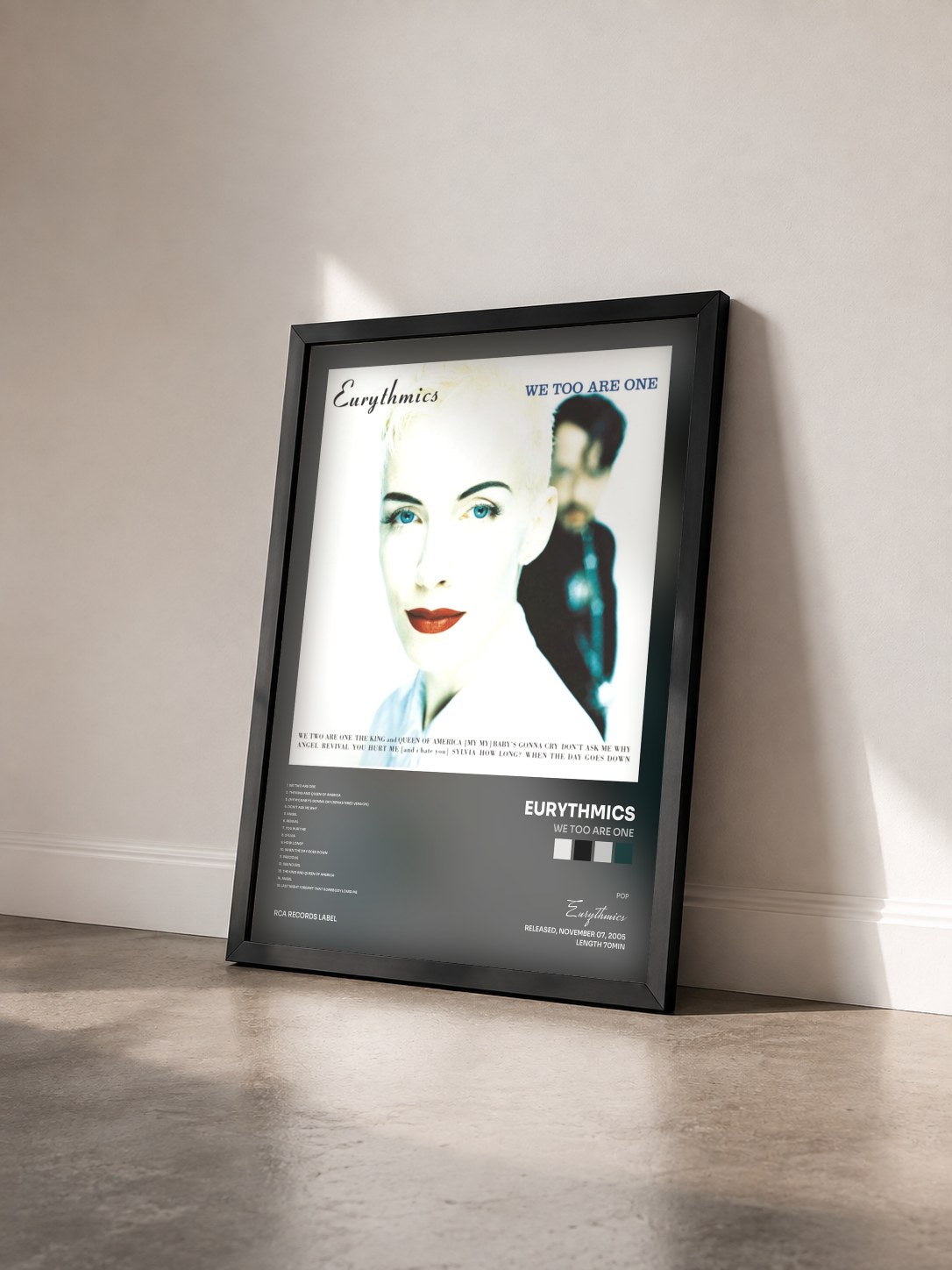 #noir Tableau de l'album We Too Are One de Eurythmics vu de trois quarts, cadre noir