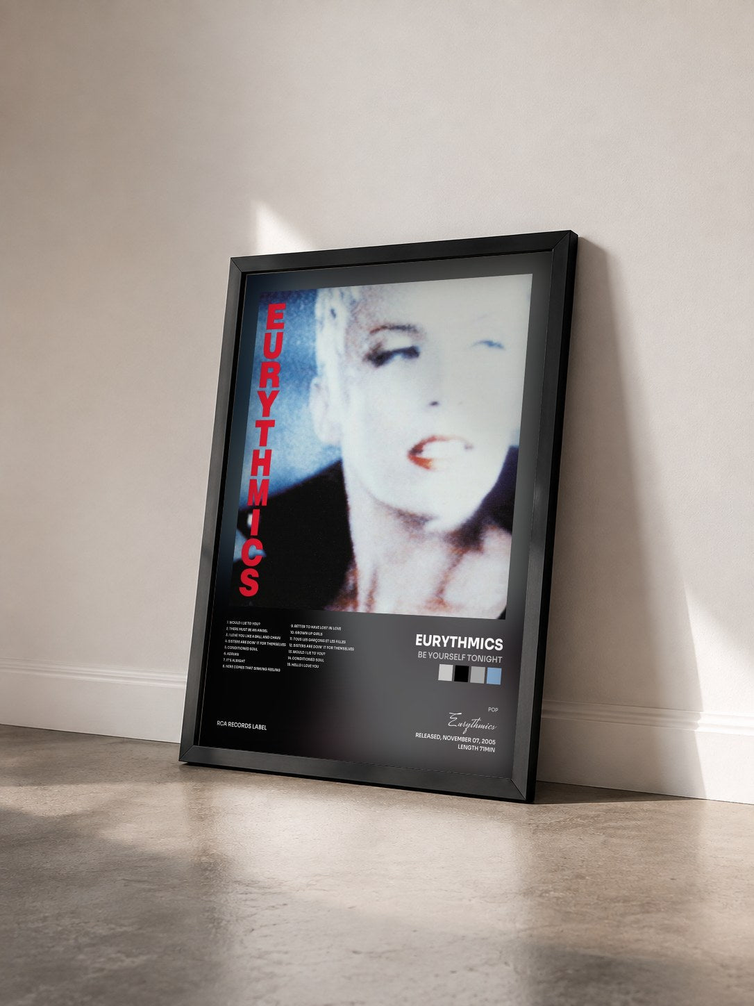 #noir Tableau de l'album Be Yourself Tonight de Eurythmics vu de trois quarts, cadre noir