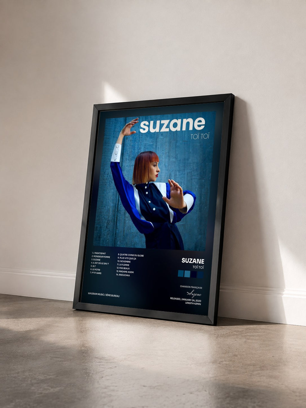 #noir Tableau de l'album Toï Toï de Suzane vu de trois quarts, cadre noir