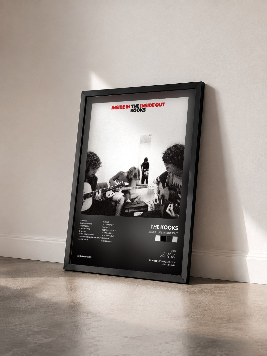 #noir Inside In / Inside Out by The Kooks as a framed art print seen at an angle, black frame