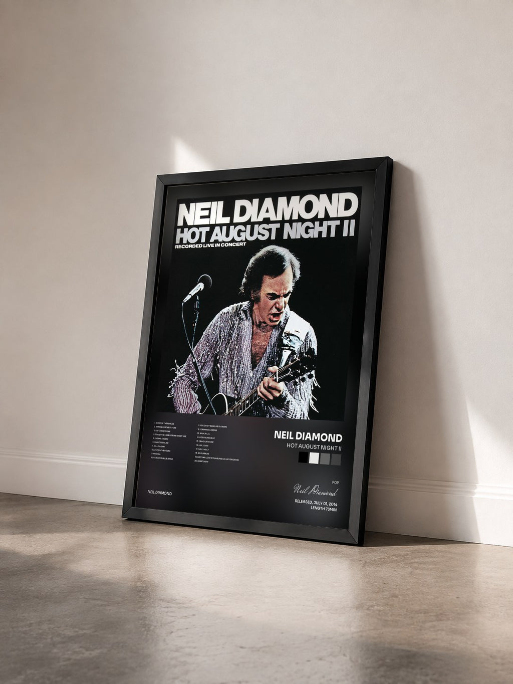 #noir Hot August Night II by Neil Diamond as a framed art print seen at an angle, black frame
