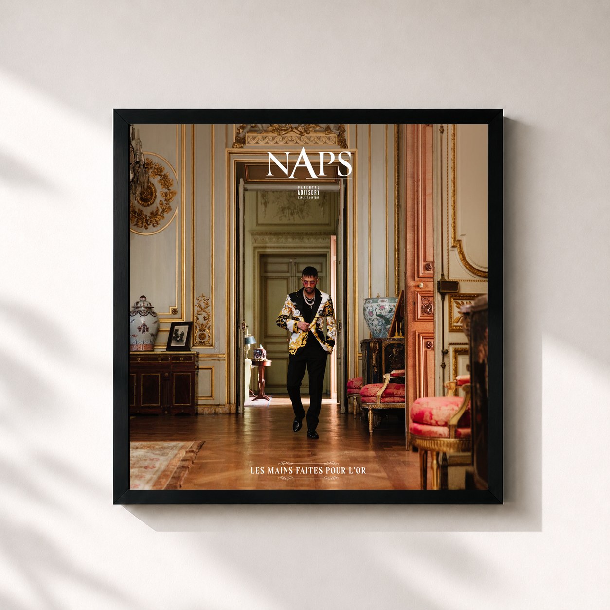 #noir Tableau carré de l'album Les mains faites pour l'or de Naps, cadre noir 32x32 cm