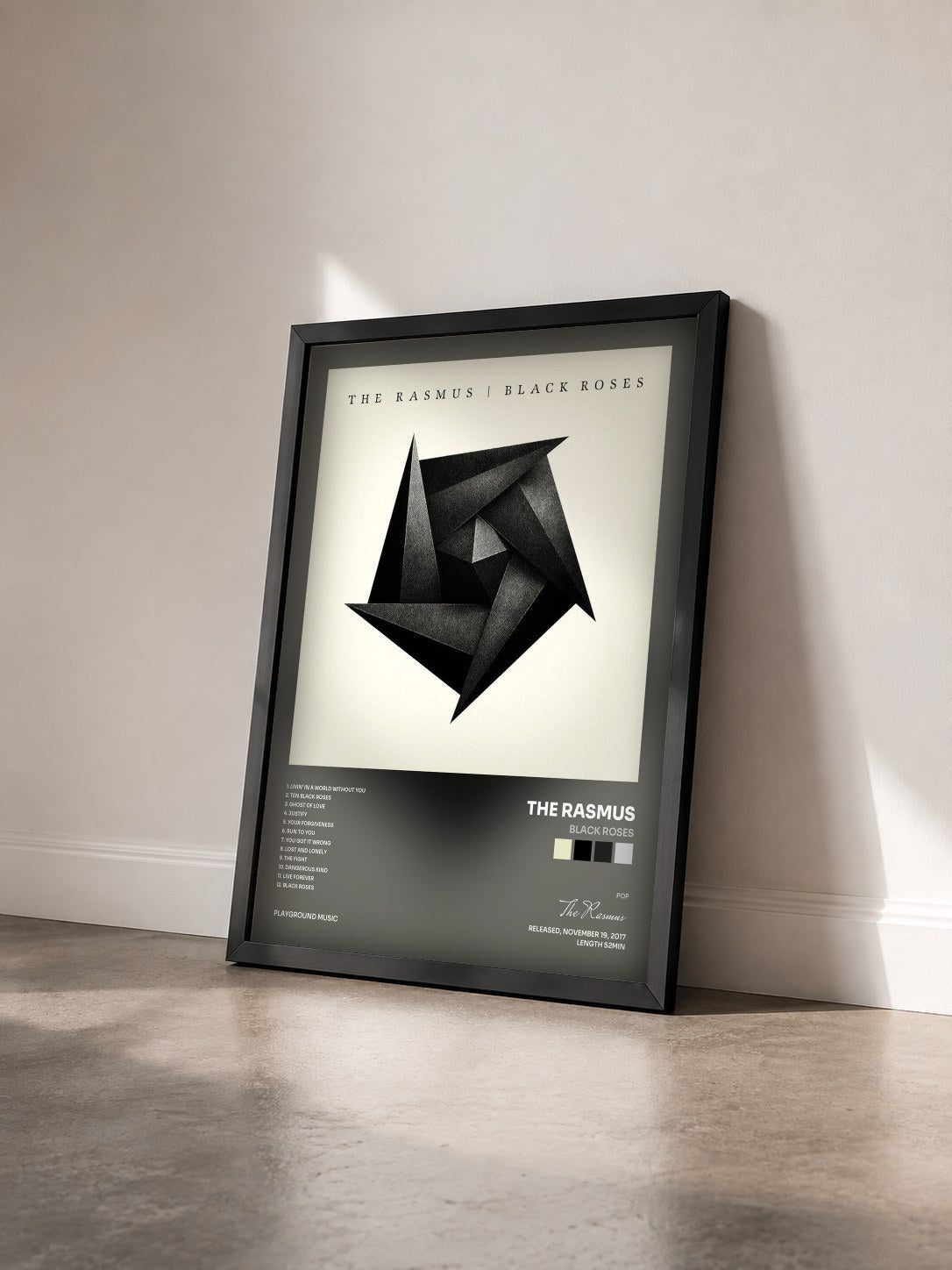 #noir Tableau de l'album Black Roses de The Rasmus vu de trois quarts, cadre noir