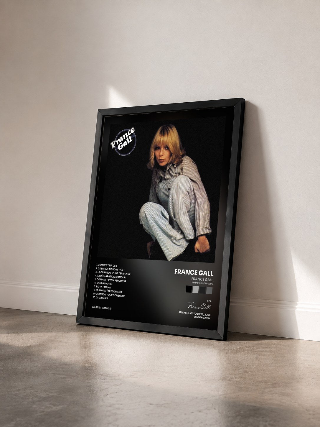 #noir France Gall (Remasterisé en 2004) de France Gall en lámina enmarcada vista de tres cuartos, marco negro