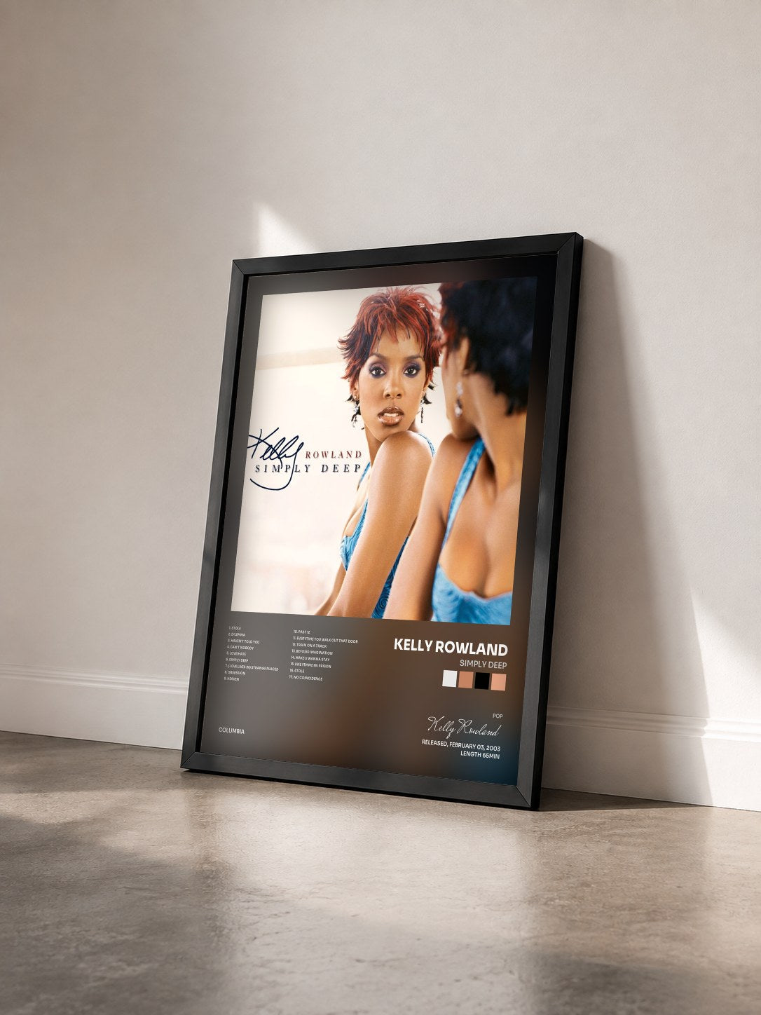 #noir Tableau de l'album Simply Deep de Kelly Rowland vu de trois quarts, cadre noir
