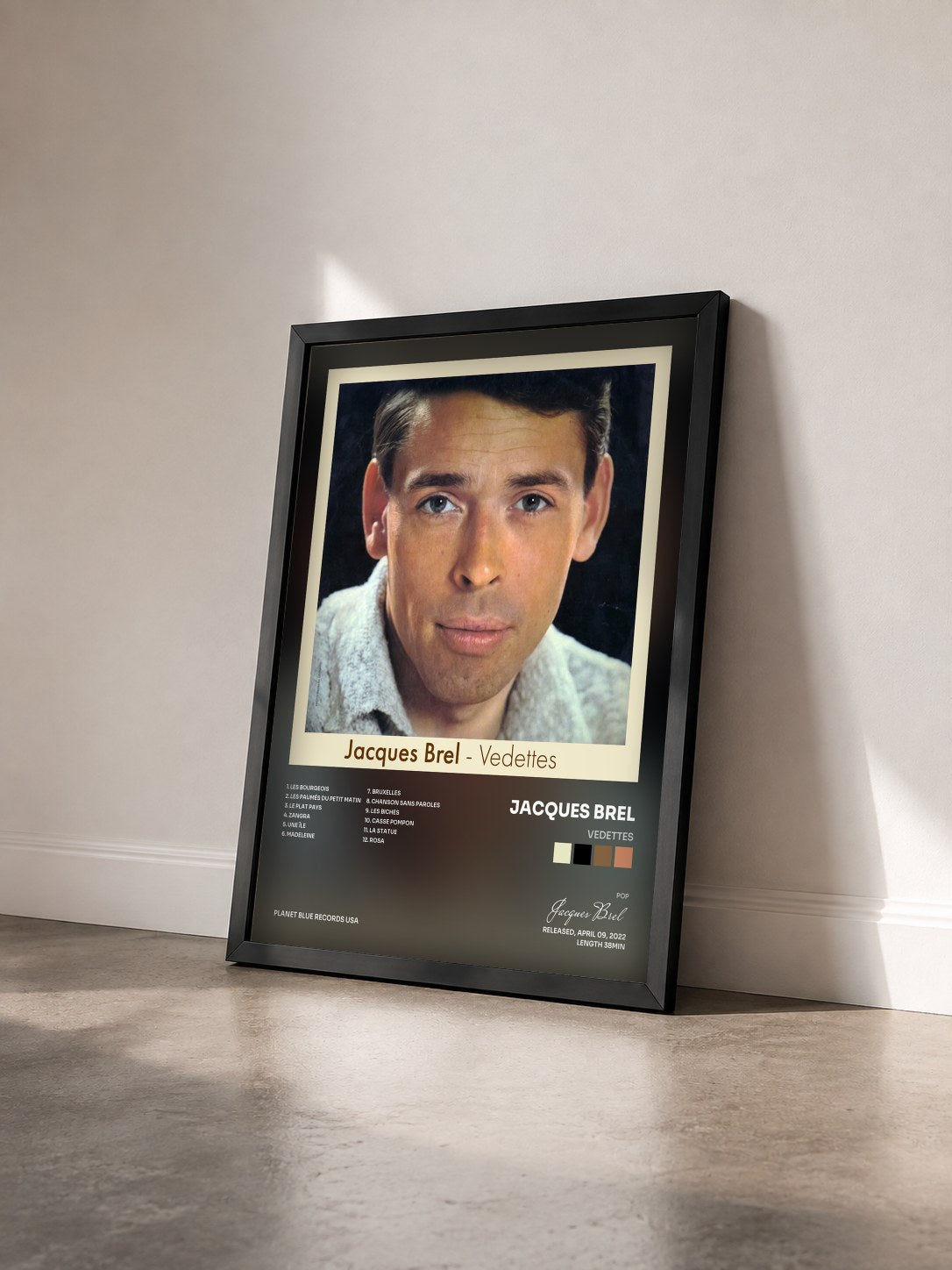 #noir Tableau de l'album Vedettes de Jacques Brel vu de trois quarts, cadre noir