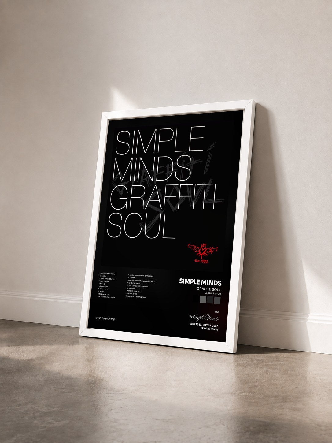#blanc Graffiti Soul (Deluxe Edition) di Simple Minds in stampa incorniciata vista di tre quarti, cornice bianca