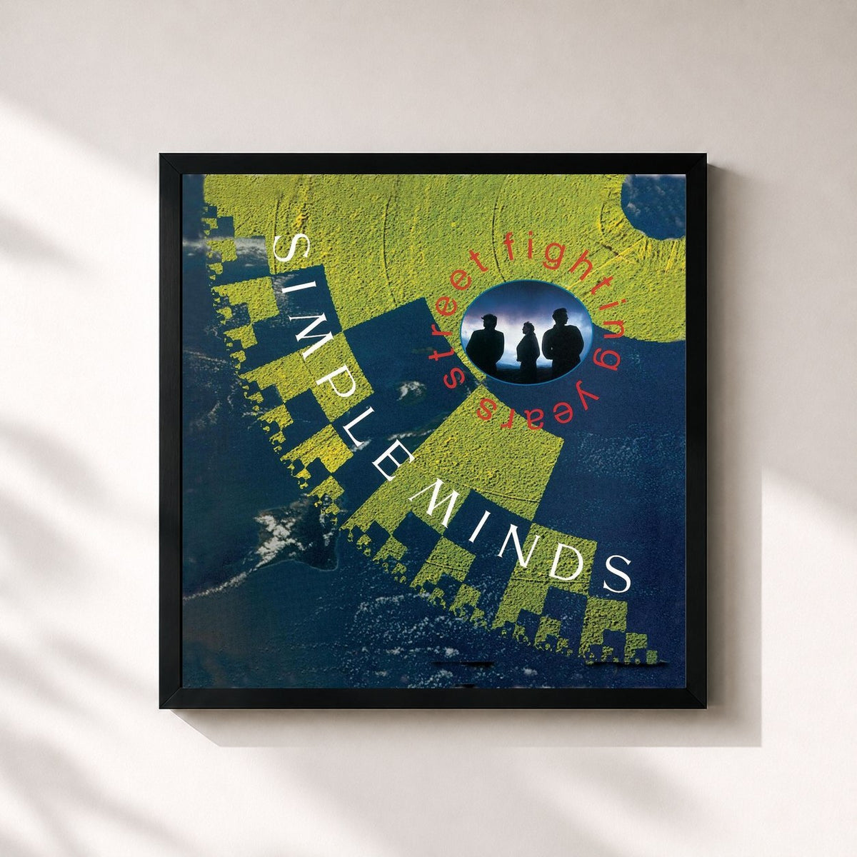 #noir Street Fighting Years de Simple Minds en lámina cuadrada enmarcada, marco negro de 32x32 cm