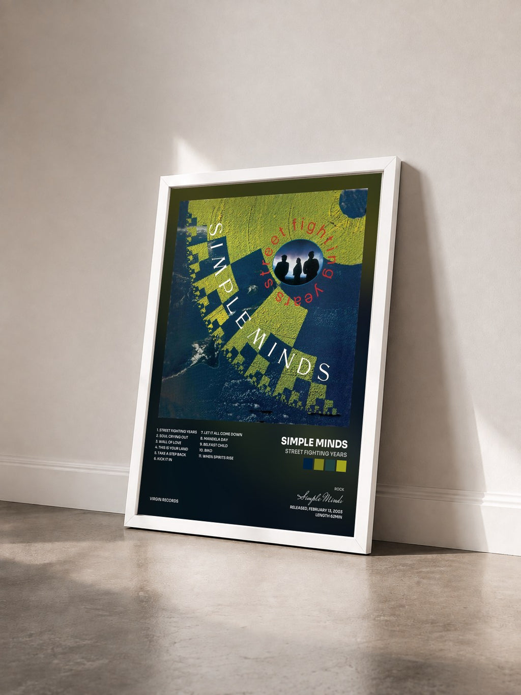 #blanc Street Fighting Years by Simple Minds as a framed art print seen at an angle, white frame