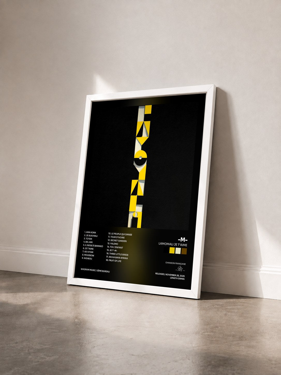#blanc Tableau de l'album Lamomali Je t'aime de -M- vu de trois quarts, cadre blanc