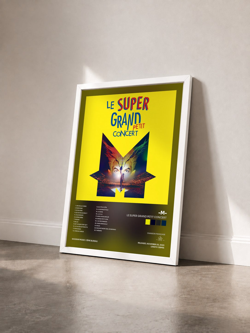 #blanc Tableau de l'album Le super grand petit concert de -M- vu de trois quarts, cadre blanc
