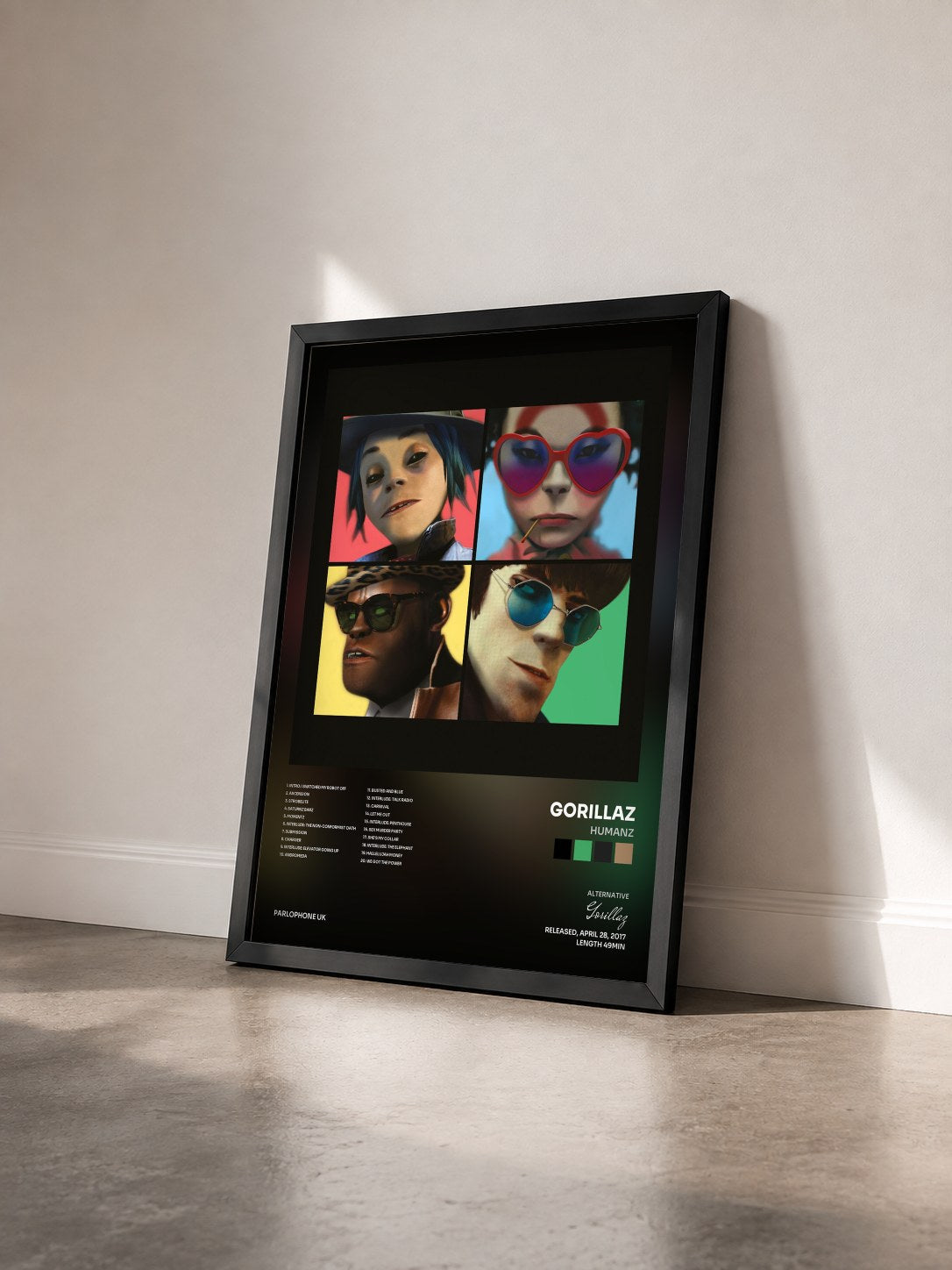 #noir Tableau de l'album Humanz de Gorillaz vu de trois quarts, cadre noir