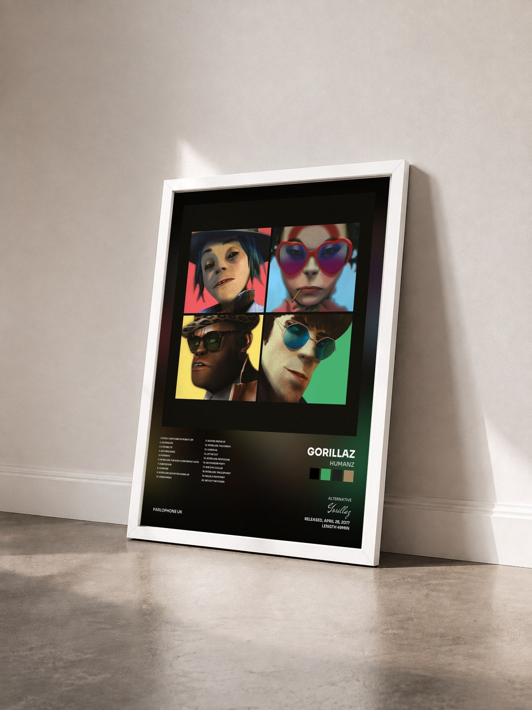 #blanc Tableau de l'album Humanz de Gorillaz vu de trois quarts, cadre blanc