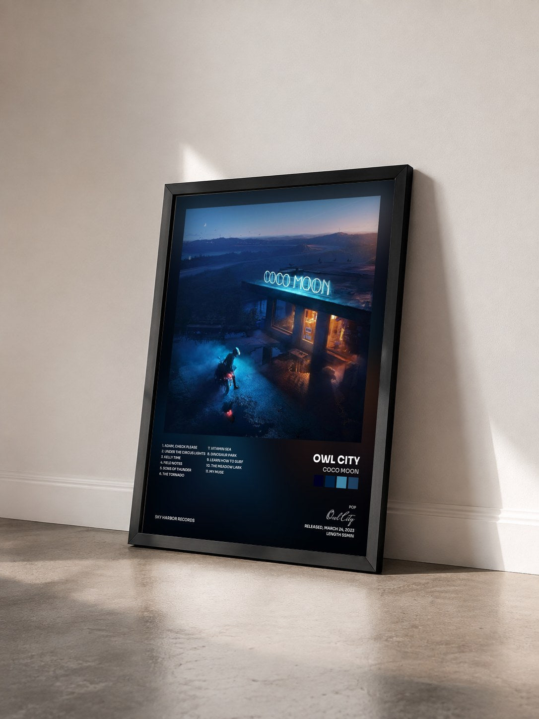 #noir Coco Moon by Owl City as a framed art print seen at an angle, black frame
