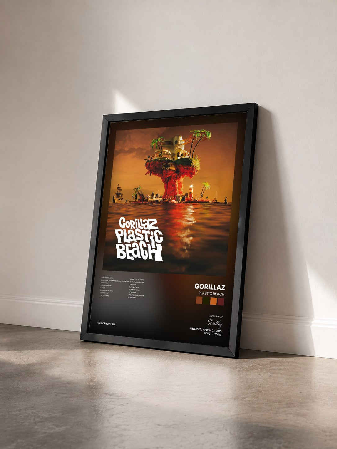 #noir Plastic Beach by Gorillaz as a framed art print seen at an angle, black frame