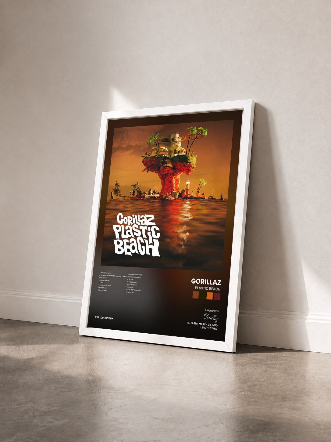 #blanc Plastic Beach by Gorillaz as a framed art print seen at an angle, white frame