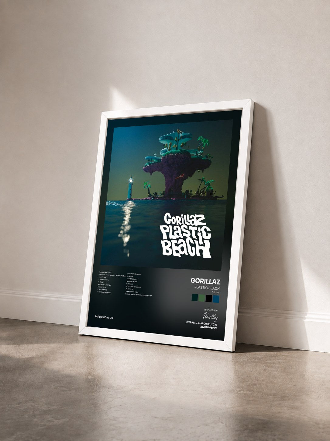 #blanc Tableau de l'album Plastic Beach (Deluxe) de Gorillaz vu de trois quarts, cadre blanc
