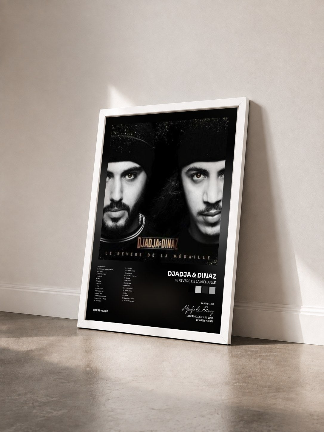 #blanc Le revers by la médaille de Djadja & Dinaz as a framed art print seen at an angle, white frame