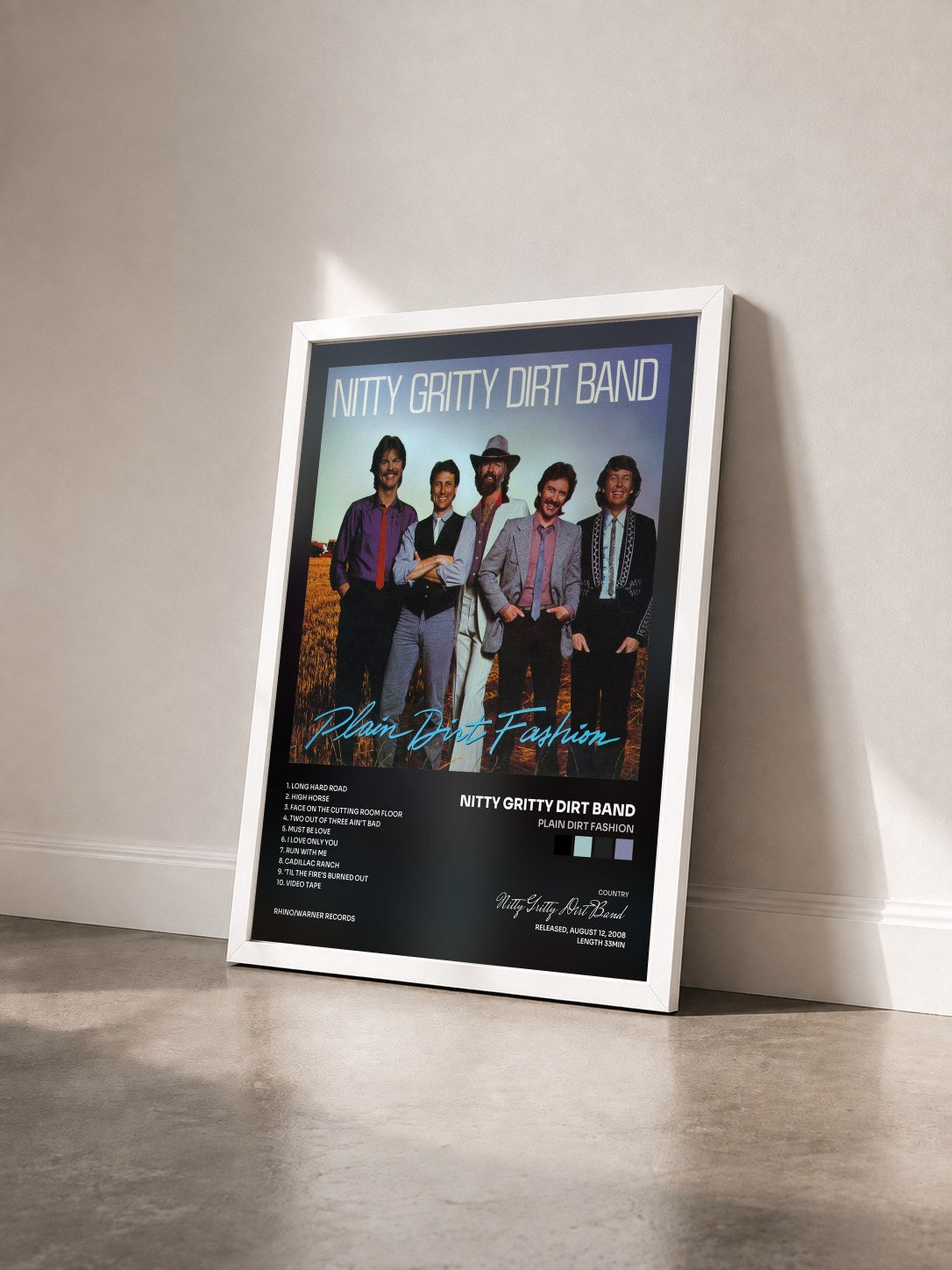#blanc Tableau de l'album Plain Dirt Fashion de Nitty Gritty Dirt Band vu de trois quarts, cadre blanc