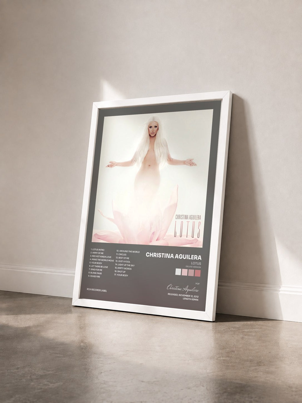 #blanc Tableau de l'album Lotus (Deluxe Version) de Christina Aguilera vu de trois quarts, cadre blanc
