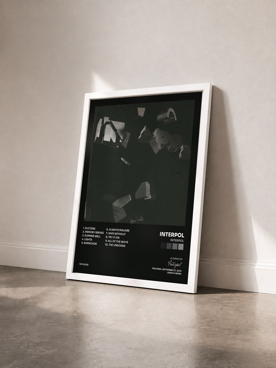#blanc Tableau de l'album Interpol de Interpol vu de trois quarts, cadre blanc
