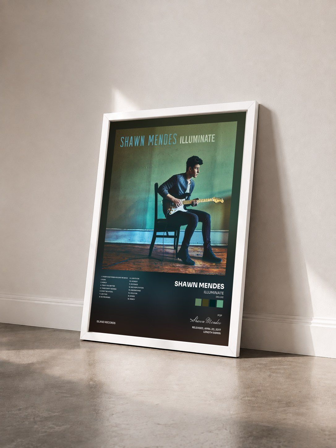 #blanc Illuminate (Deluxe) by Shawn Mendes as a framed art print seen at an angle, white frame