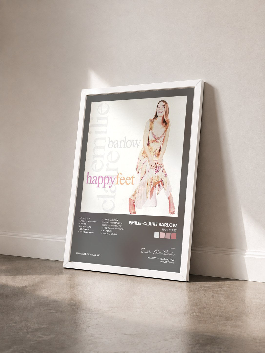 #blanc Tableau de l'album Happyfeet de Emilie-Claire Barlow vu de trois quarts, cadre blanc