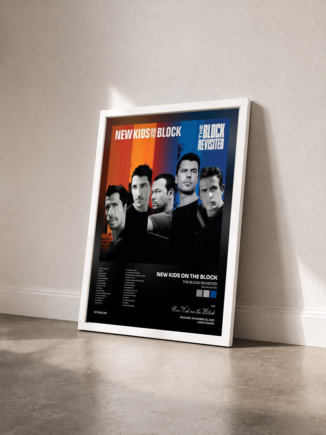 #blanc Tableau de l'album The Block Revisited (Deluxe Edition) de New Kids on the Block vu de trois quarts, cadre blanc