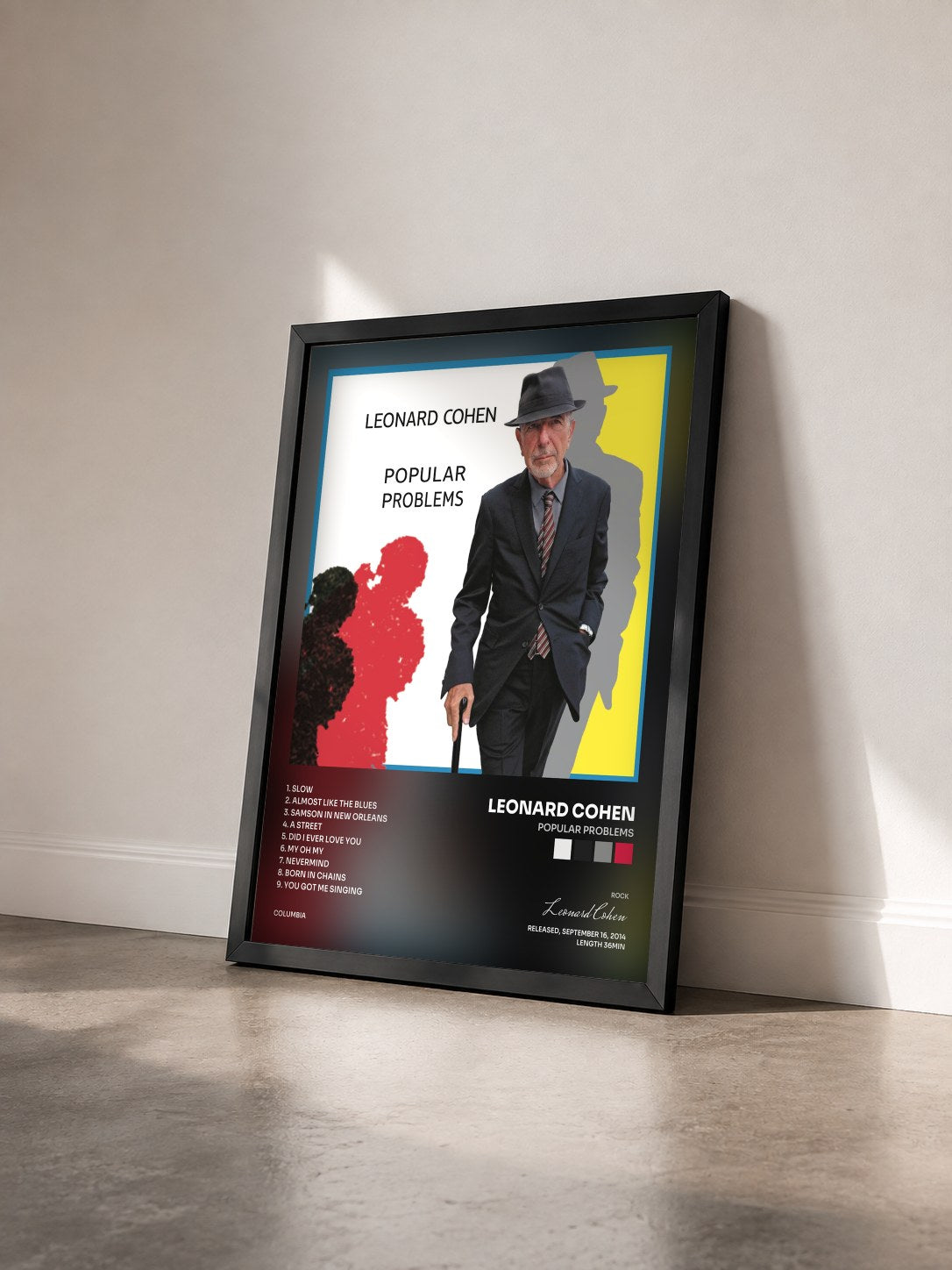 #noir Tableau de l'album Popular Problems de Leonard Cohen vu de trois quarts, cadre noir