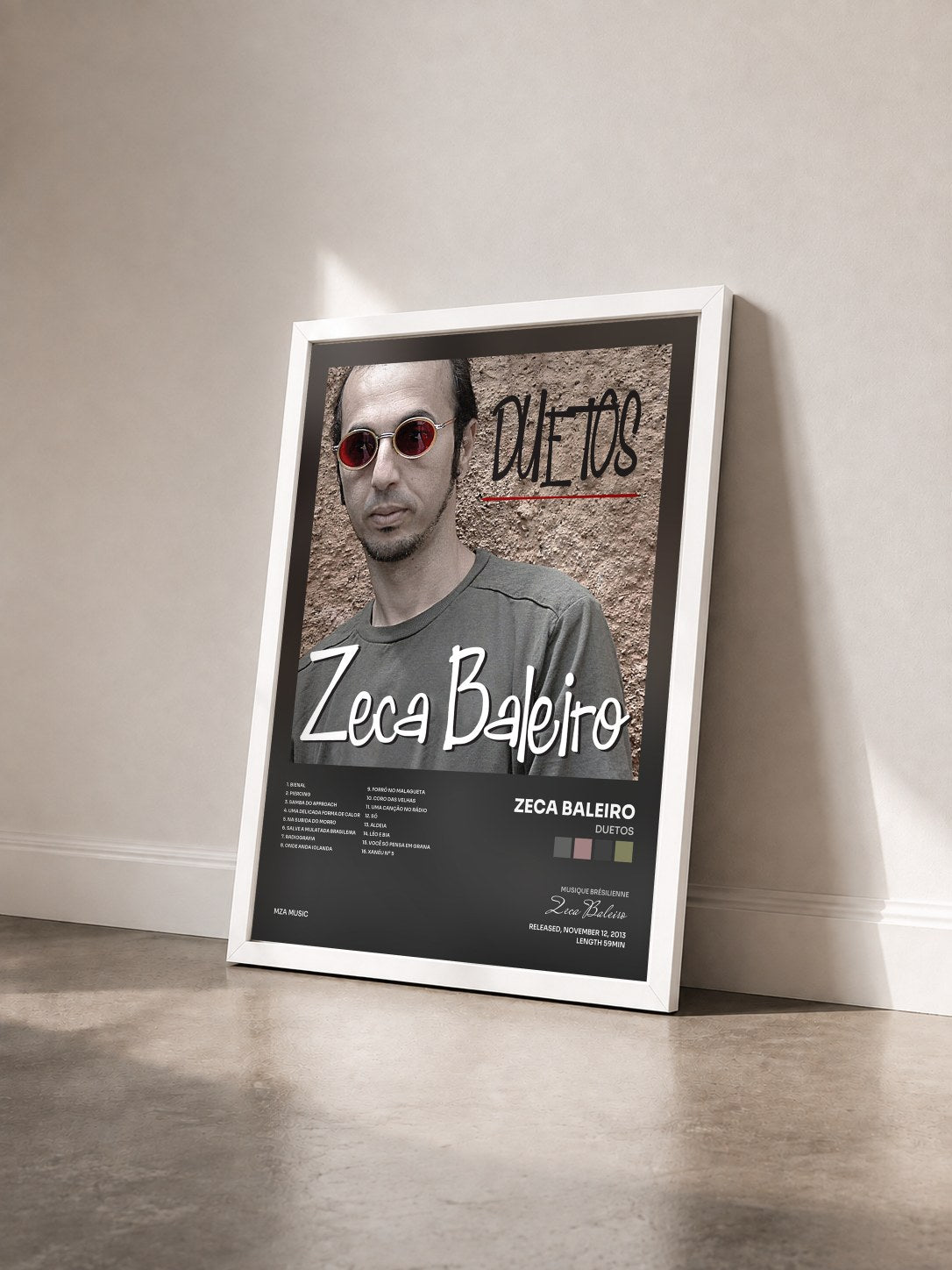 #blanc Tableau de l'album Duetos de Zeca Baleiro vu de trois quarts, cadre blanc