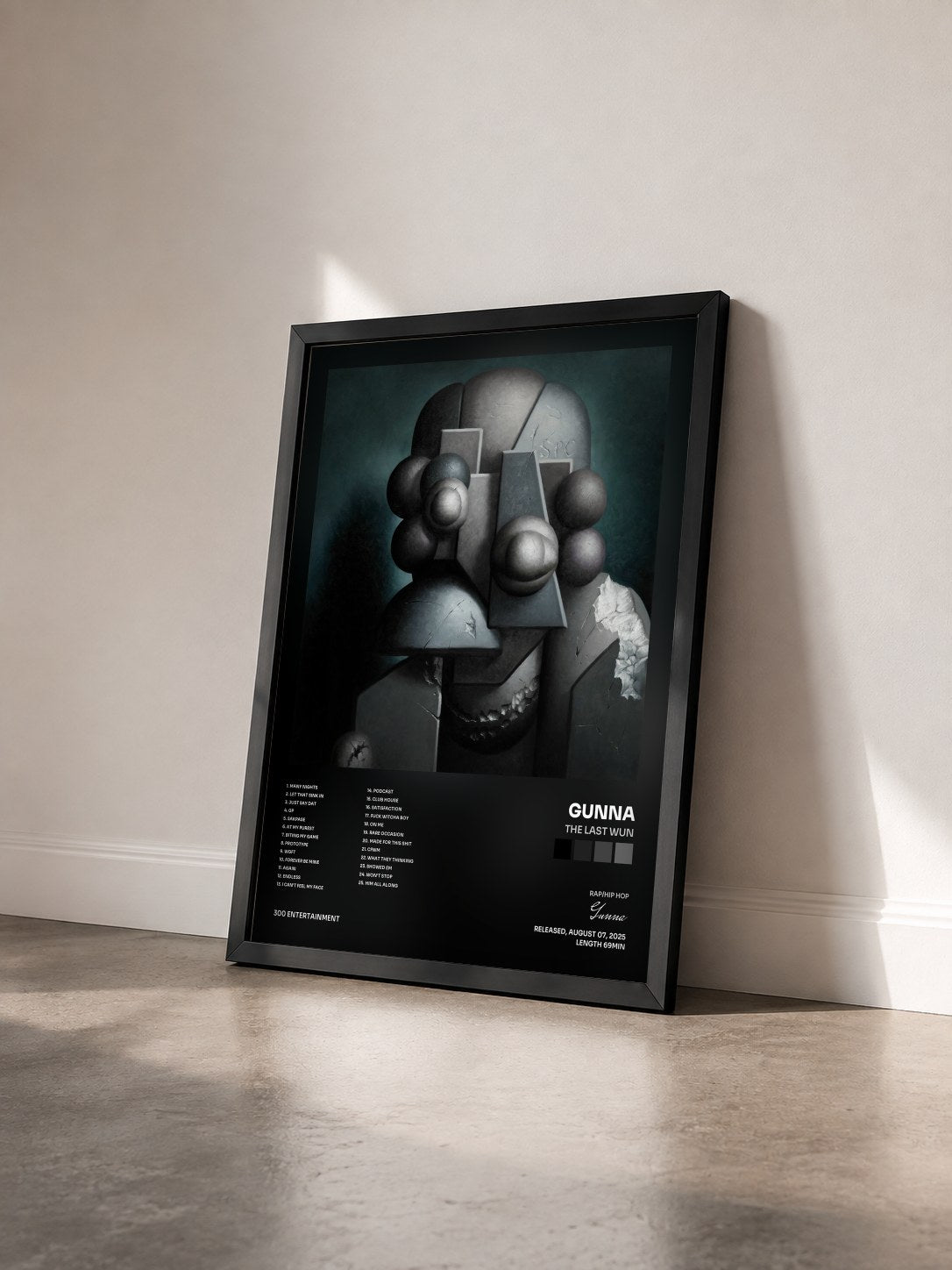 #noir Tableau de l'album The Last Wun de Gunna vu de trois quarts, cadre noir