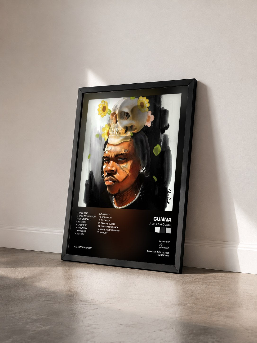 #noir Tableau de l'album a Gift & a Curse de Gunna vu de trois quarts, cadre noir
