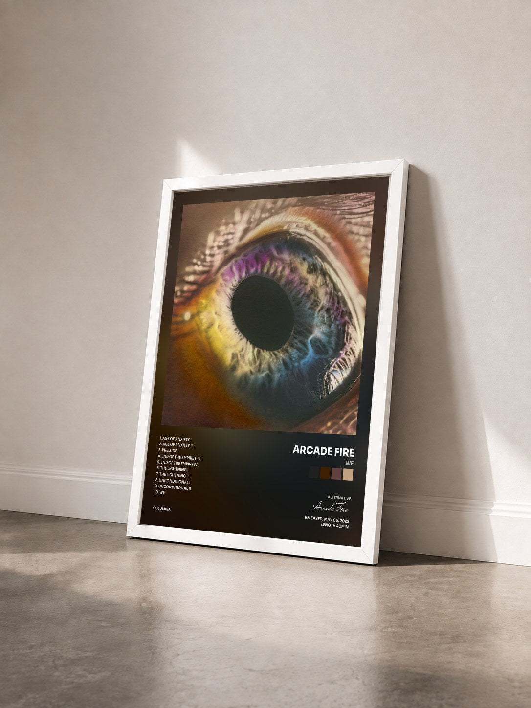 #blanc Tableau de l'album WE de Arcade Fire vu de trois quarts, cadre blanc