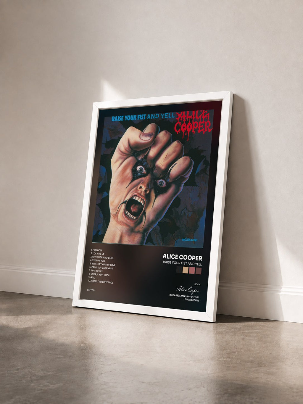 #blanc Tableau de l'album Raise Your Fist And Yell de Alice Cooper vu de trois quarts, cadre blanc