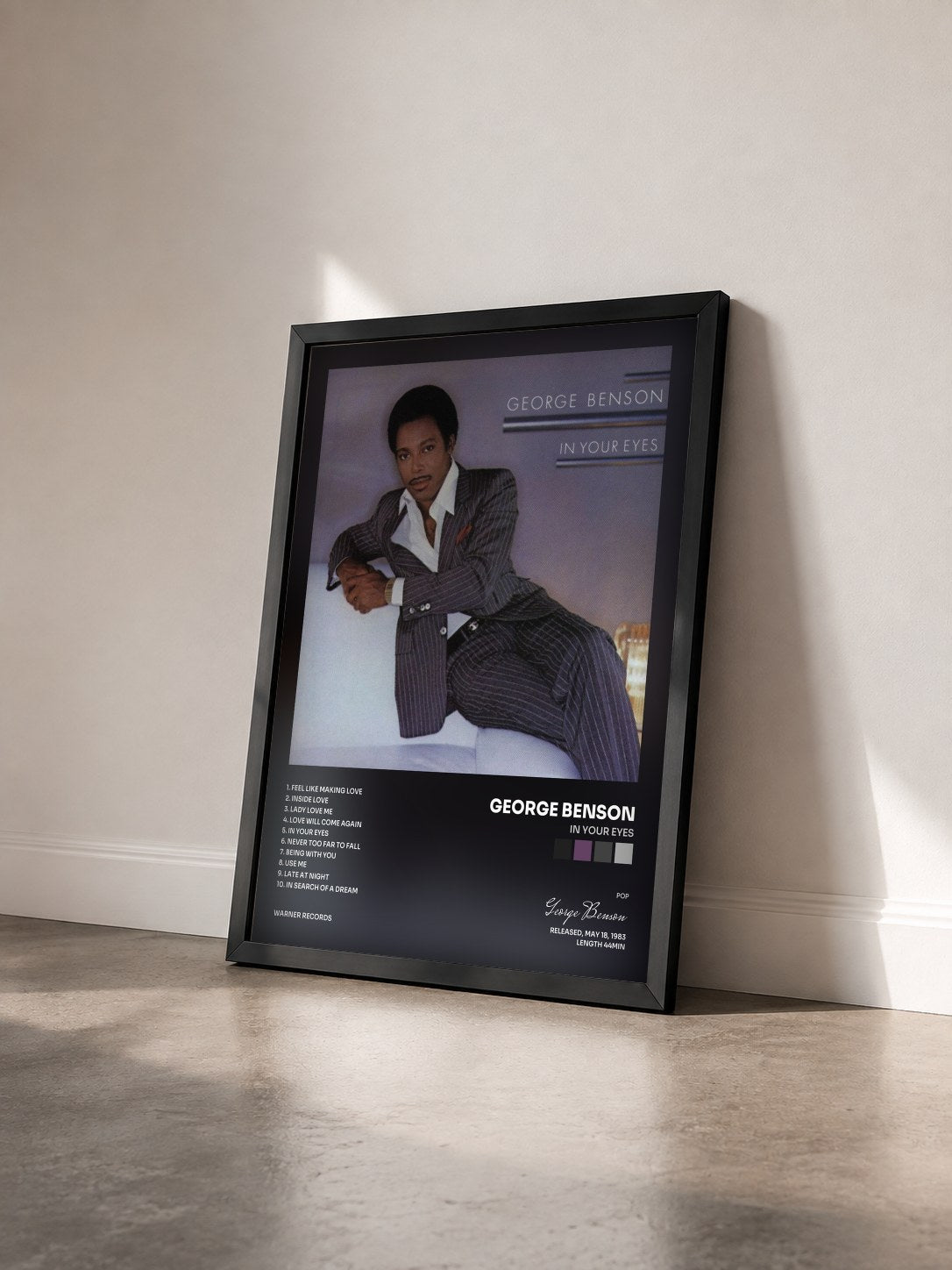 #noir In Your Eyes by George Benson as a framed art print seen at an angle, black frame
