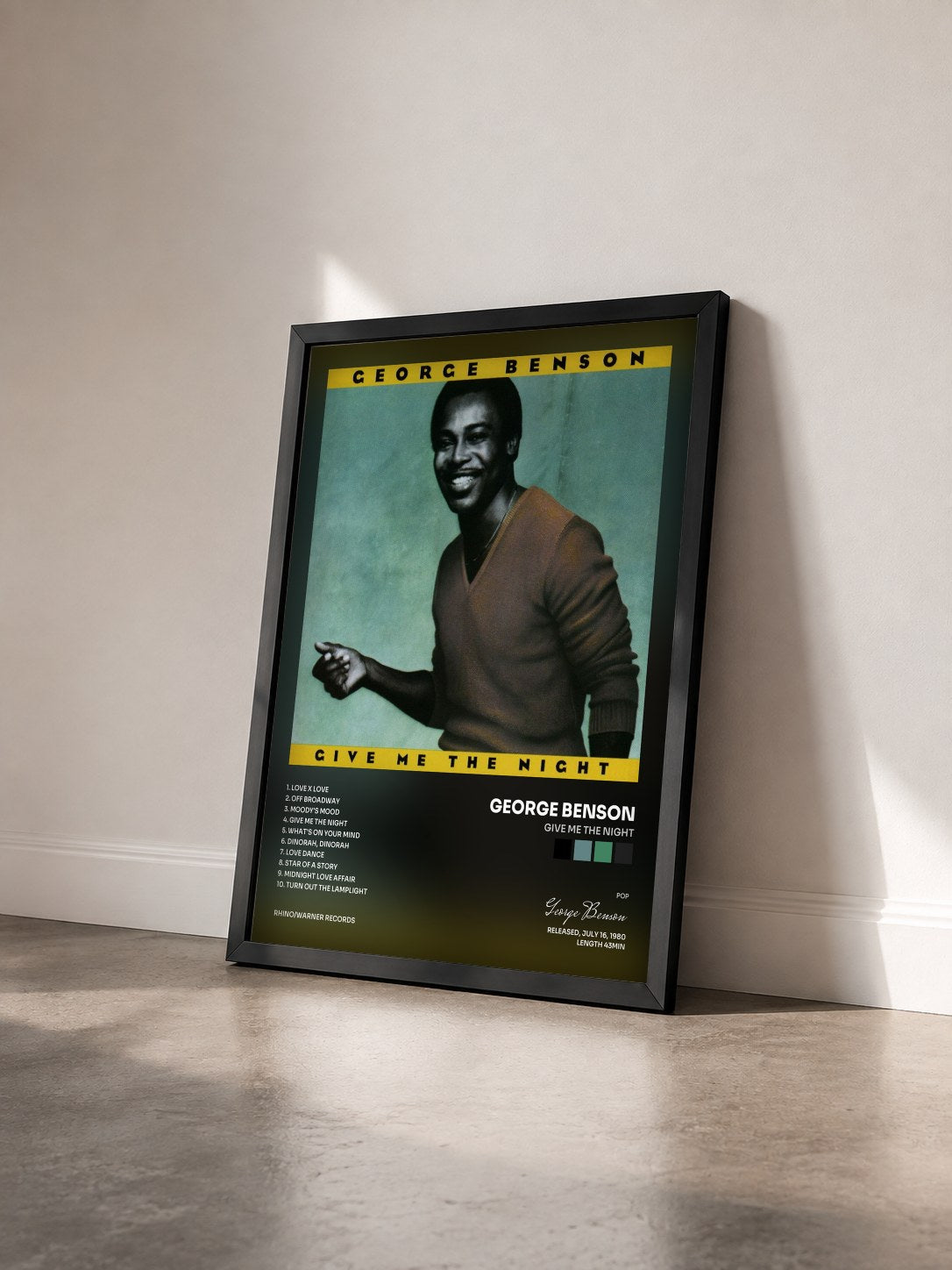 #noir Tableau de l'album Give Me the Night de George Benson vu de trois quarts, cadre noir