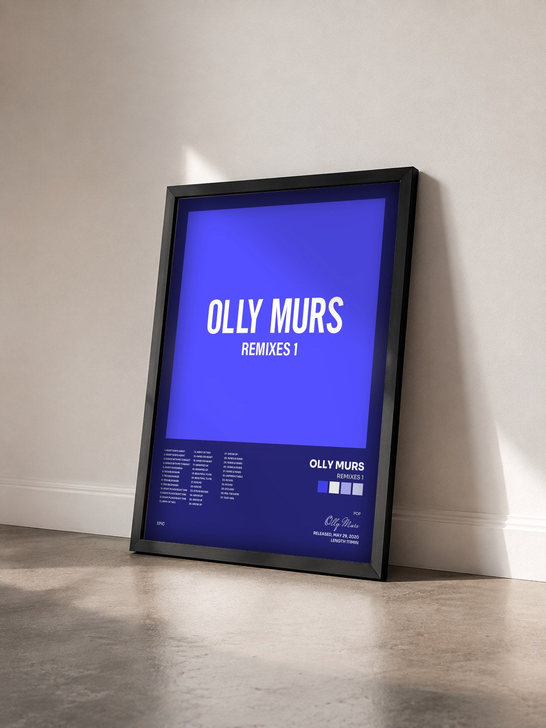 #noir Tableau de l'album Remixes 1 de Olly Murs vu de trois quarts, cadre noir