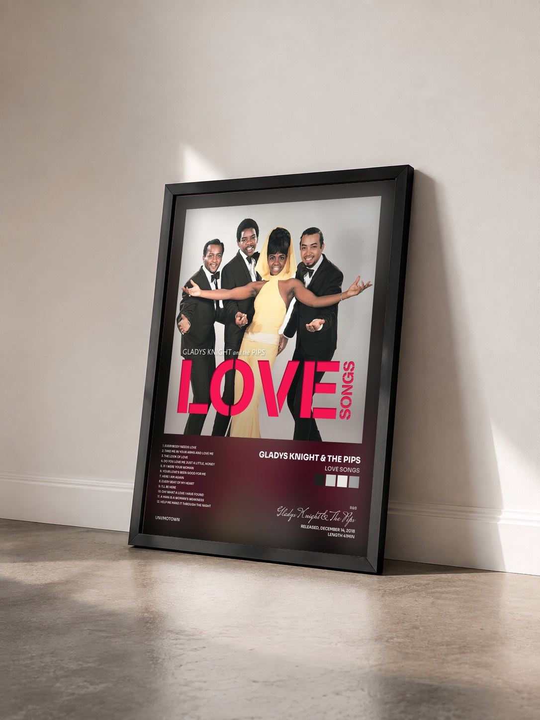 #noir Tableau de l'album Love Songs de Gladys Knight & The Pips vu de trois quarts, cadre noir