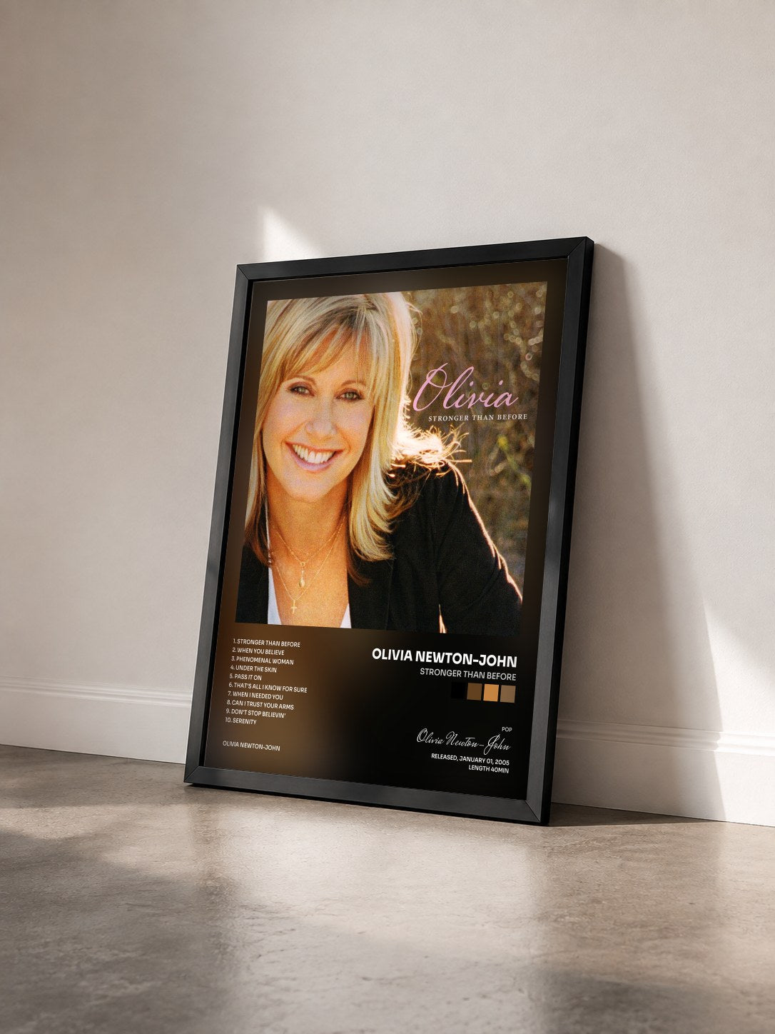 #noir Tableau de l'album Stronger Than Before de Olivia Newton-John vu de trois quarts, cadre noir