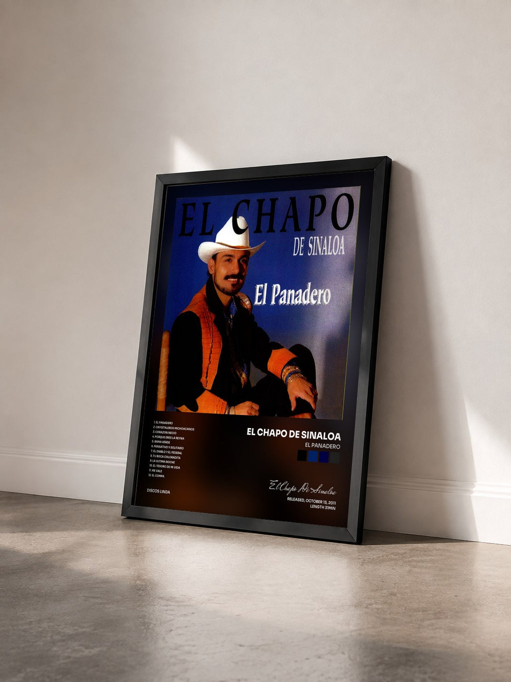 #noir Tableau de l'album El Panadero de El Chapo De Sinaloa vu de trois quarts, cadre noir