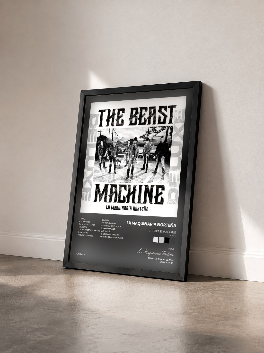 #noir Tableau de l'album The Beast Machine (Deluxe) de La Maquinaria Norteña vu de trois quarts, cadre noir