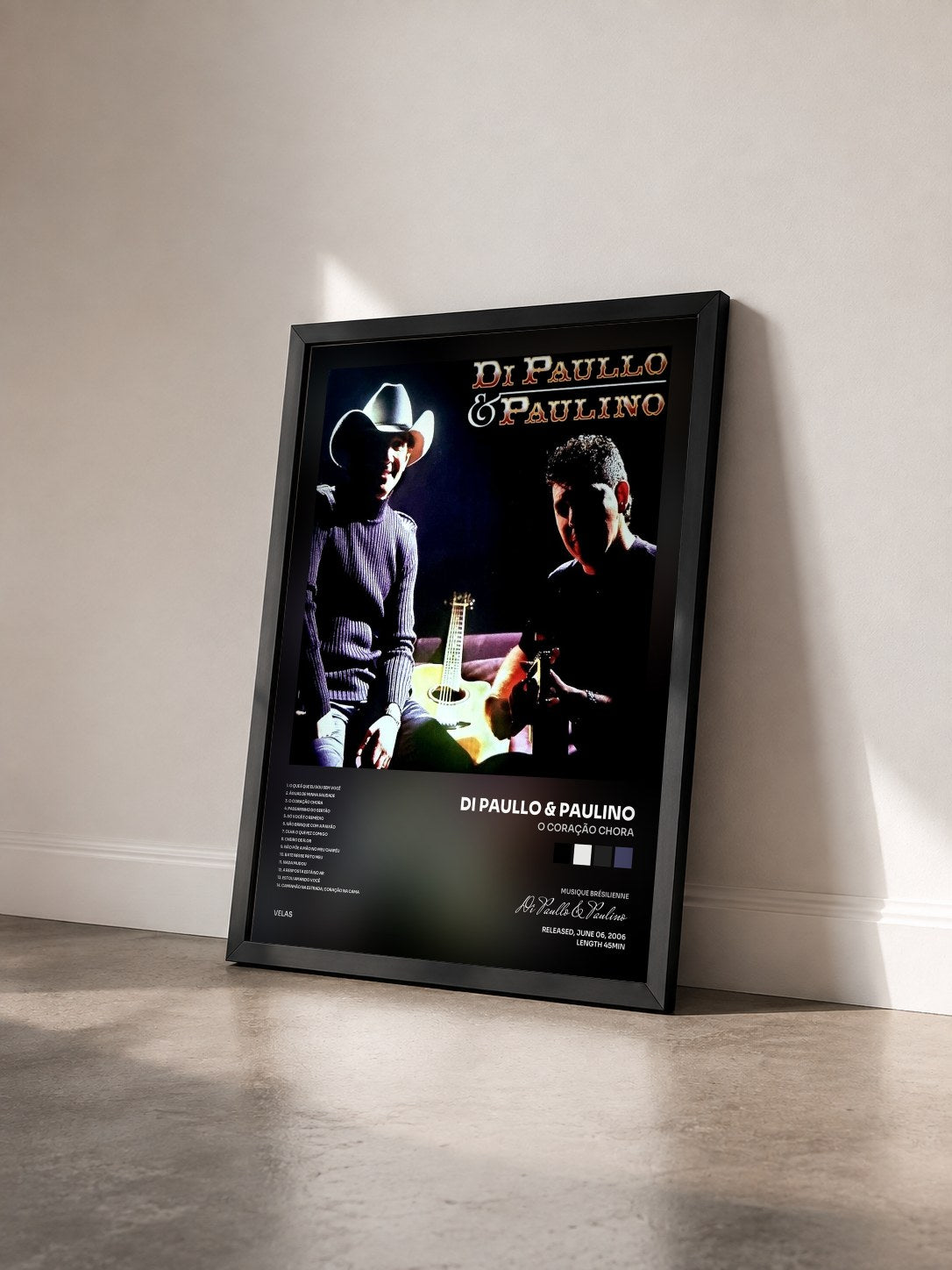 #noir Tableau de l'album O Coração Chora de Di Paullo & Paulino vu de trois quarts, cadre noir