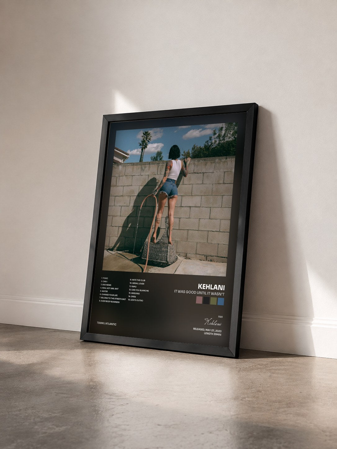 #noir It Was Good Until It Wasn't by Kehlani as a framed art print seen at an angle, black frame
