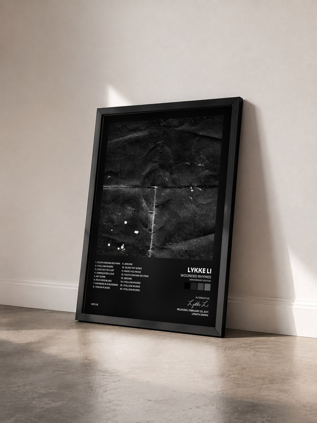 #noir Tableau de l'album Wounded Rhymes (Anniversary Edition) de Lykke Li vu de trois quarts, cadre noir