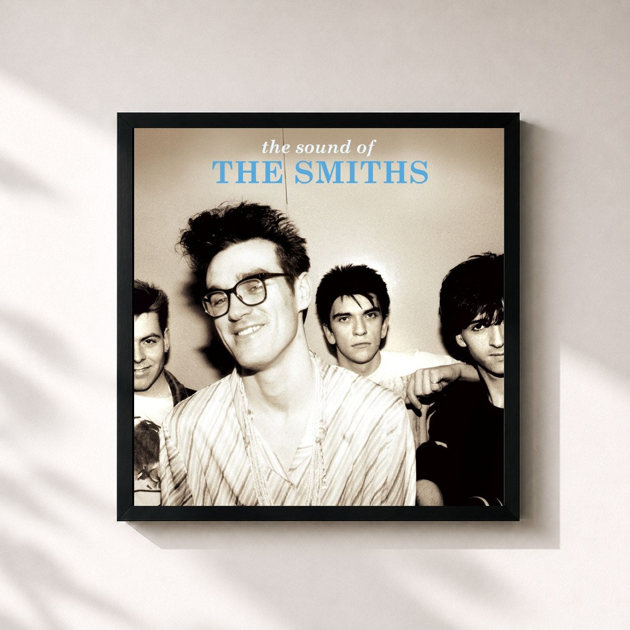 #noir The Sound of the Smiths (Deluxe; 2008 Remaster) by The Smiths as a square framed art print, black 32x32 cm frame